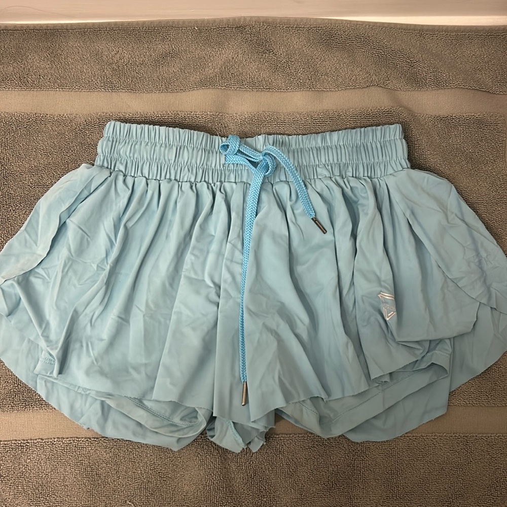 light blue flowy athletic shorts